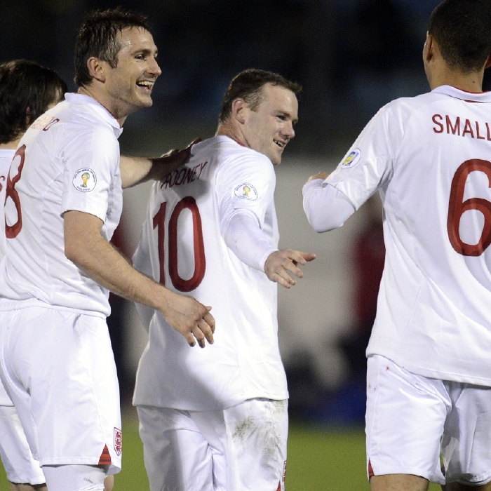 Wayne Rooney celebrates after scoring in an 8-0 victory over San Marino