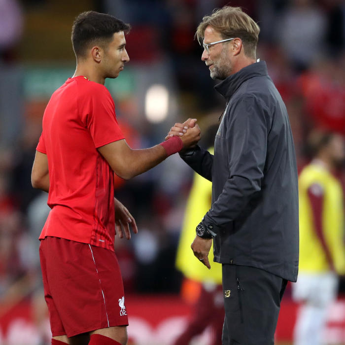 Jurgen Klopp with his first signing as Liverpool boss, Marko Grujic