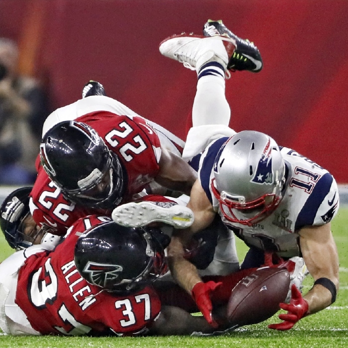 Julian Edelman (L) made one of the all-time great NFL catches in Super Bowl LI