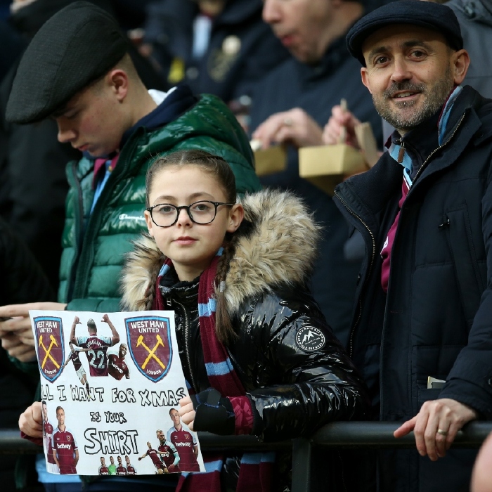 Signs asking for player's shirts are now a common occurence in the Premier League